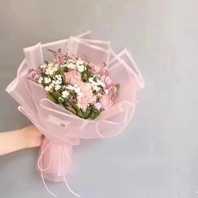 China Waterproof Transparent Matte Non Woven Tissue Flowers Wrapping Paper For Bouquet for sale