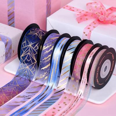 China Gold Foil Chiffon Ribbon Printing Custom Logo Satin 100% Polyester For Packaging Roll for sale