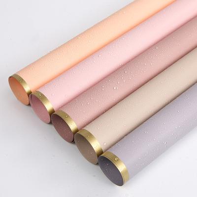China Matt Florist Wrapping Paper 50 Micron Bouquet Wrap Sheets With Golden Border for sale