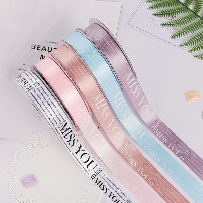 China 25mmx50y Cake Packing Satin Ribbon Printed Miss You Gift Wrap Ribbon for sale