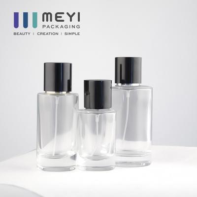 China No Spill 100ml Clear Glass Perfume Bottles With Black Magnetic Perfume Cap for sale