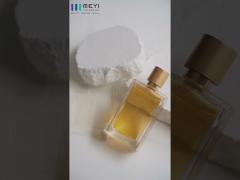 Perfume bottle with matt gold perfume cap