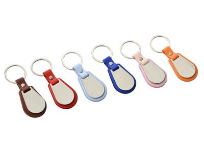 China Debossed Logo PU Leather Keychain Keyring Edge Coating Metal Key Holder for sale