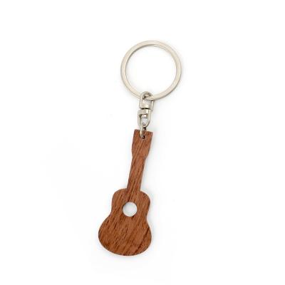 China Vintage Style Walnut Wood Guitar Keychain Engraved - Durable And Stylish for sale