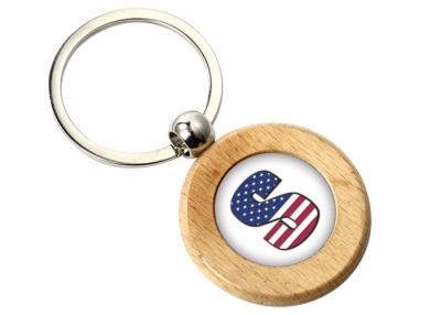 China Epoxy Doming Round Cute Metal Keychain 9mm Thickness Plain Wooden Keychain for sale