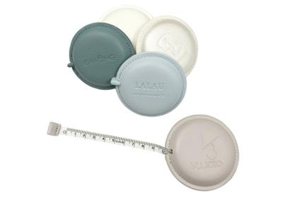 중국 70mm Round Personalized retractable cloth tape measure Soft PU clothing measuring tape 판매용