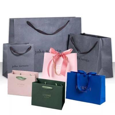 China Custom Printed Paper Tote Gift Bags Ribbon Handle For Boutique for sale
