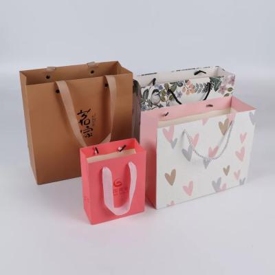 China Geschenktragetaschen mit individuellem Logodruck, personalisierte glänzende Laminierung zu verkaufen