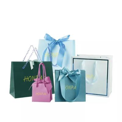 China Custom Thick Marble Printed Paper Carrier Bags 28x20x10cm 250g C1s Art Paper for sale