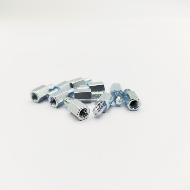 Multiple hex standoff screws showing size comparison