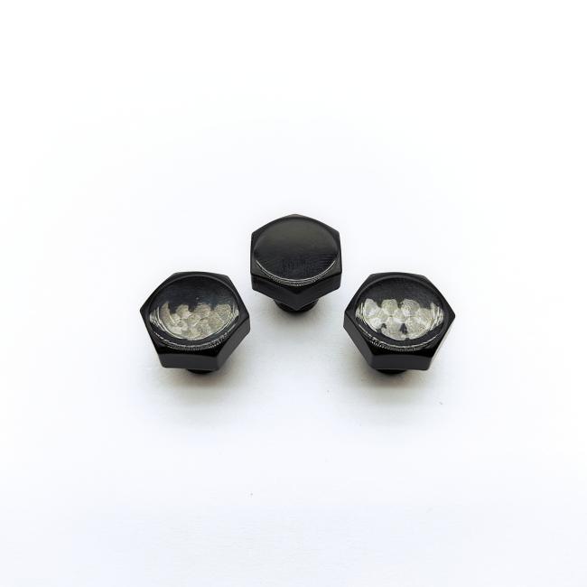 Black M8 hex head wheel bolts in packaging
