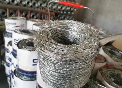 China Galvanized Barbed Concertina Razor Wire PVC Coated 14x14 16x16 500m for sale