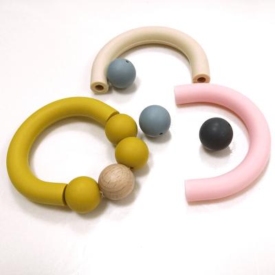 China toddlers Silicone Beads Teether BPA Free Teething Rings Customized Logo for sale