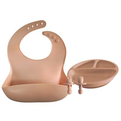 China 500g Baby Silicone Products Divided Suction Plates Bib Weaning Set With Spoon And Fork for sale