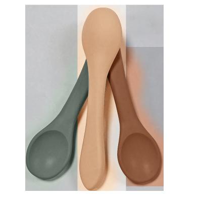 China OEM Colorful Reusable kids soft Silicone Feeding Spoon 13.8*3.5*1cm 25g for sale