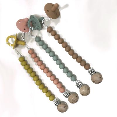 China BPA Free Customized Baby Silicone Pacifier Holder Clips Chains With Baby Pacifier for sale