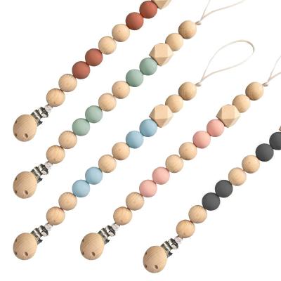 China Baby Feeding Silicone Pacifier Holder 20mm Beads Wooden Pacifier Clips for sale