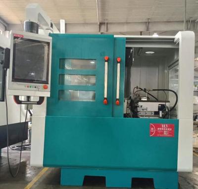 China Step Down máquina de moagem de ferramentas CNC carregamento e descarregamento automático à venda