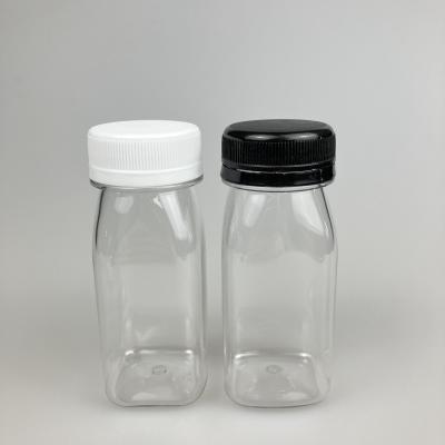 China 60 ml garrafa de sumo quadrada garrafa de bebida garrafa quadrada garrafa de bebida com tampa multicolorida à venda