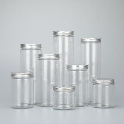 Cina Bottiglia di plastica trasparente all'ingrosso economica con coperchio, vasetti a forma di vaso di plastica, bottiglia di plastica per scrub con fornitura di fabbrica in vendita