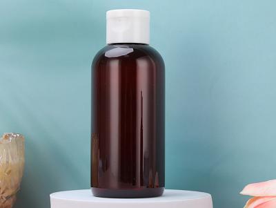 China NUEVAS PE botellas ambarinas CRUDAS del ANIMAL DOMÉSTICO del 100% con Flip Top Cap For Toner en venta
