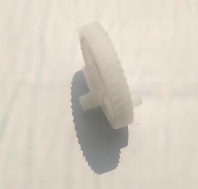 Китай Шестерни POM точности зубов M0.7 43 пластиковые отлили спиральное в форму для машин сока продается
