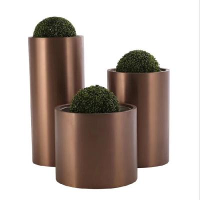 China Kinds of gold flower pot planters metal round flower pot for sale