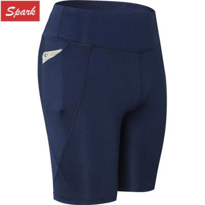 China Cinco pantalones cortos elásticos de las mujeres del gimnasio del deporte atlético del bolsillo de la cintura alta de la longitud en venta
