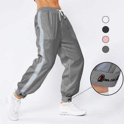 China Woman Cropped Pants Quick Dry With Pocket  Running Workout Leggings for sale