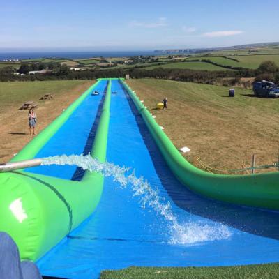 China 100m Giant Inflatable Slip N Slide With Pool For Kids And Adults for sale