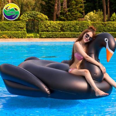 China Black Inflatable Swan Swimming Ring For Party Time Flamingo Luxury Pool Floats For Adults for sale