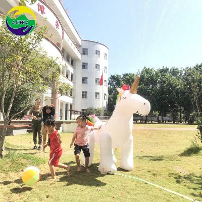 China PVC Unicorn Outdoor Inflatable Toy 100kg Sprinkler Gifts Mat Supplier For Ground for sale