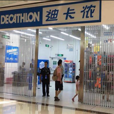 China PC Electrically Operated Lateral Sliding Shutter Door PVC Store Security Sliding Shutter Gate for sale