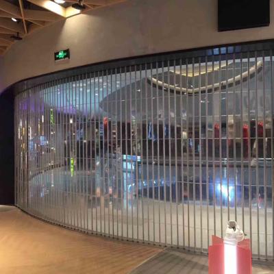 China Motorized Transparent PVC Sliding Shutter Doors For Commercial Building for sale