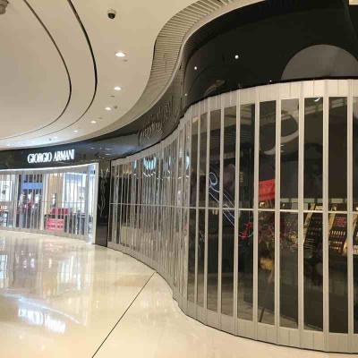 China Puertas de persianas plegables laterales manuales, cierres de seguridad de la tienda. en venta