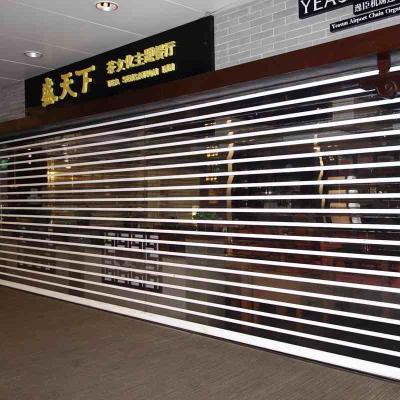 China PC100 Motorized Transparent Roller Shutter Door 2mm Thickness for sale