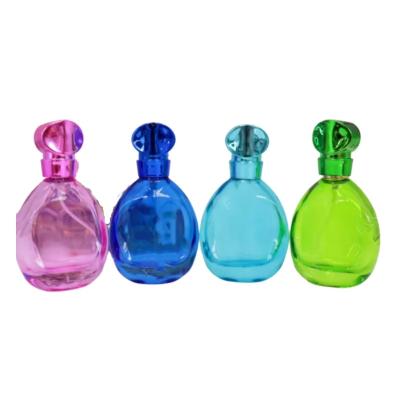 China perfume bottle cheap recycled glass bottles black blue red pink green cap plastic and metal roll frog for sale