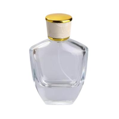 China 30ml despejan las botellas de perfume de cristal de oro y los casquillos de plata modifican el rociador para requisitos particulares en venta