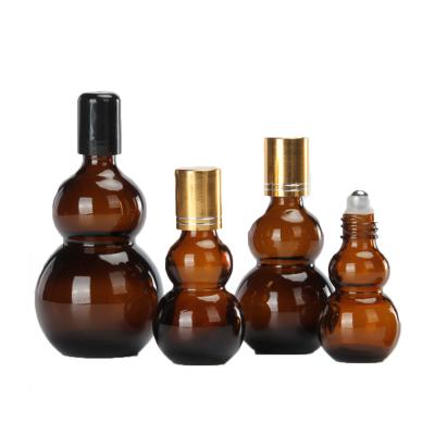 China 10-100ml Brown Double Gourd Roller Ball Essential Oil Bottle Empty Rubber Head Dropper for sale