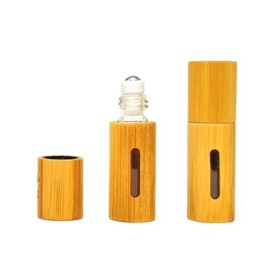 China Botella de perfume de bambú de madera de bambú del aceite esencial de la cubierta de la botella de la gota de la botella 1ml 3ml5ml10ml del rodillo en venta