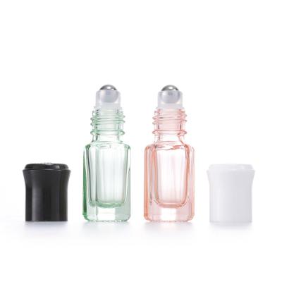 China Colorful Octagonal Glass Roller Bottles Mini Essential Oil Massage Roll On Bottle for sale