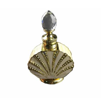 China Golden Color Refillable Glass Perfume Bottle , Customize Shape Mini Fragrance Bottles for sale