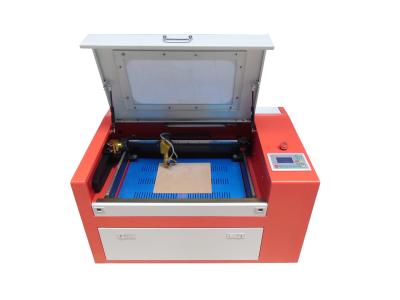 China Small Power Cnc Laser Cutter Machine / Laser Etching Machine For Cloth Leather Wool for sale