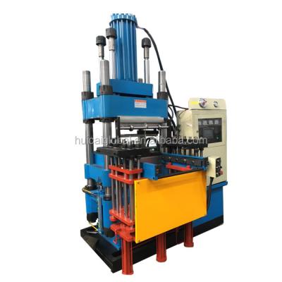 China Professional 12000 Voltage 220v Vertical Rubber Injection Molding Machine for sale