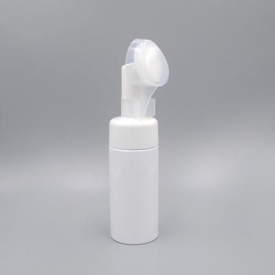 中国 100 ml Empty Plastic Cleansing Foam Pump Dispenser Bottle with Silicone Brush 販売のため