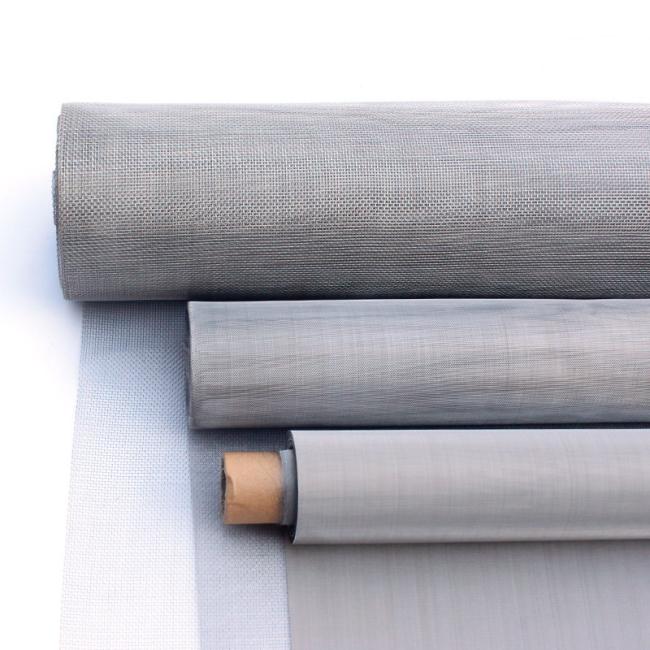 Rolls of stainless steel wire mesh in industrial setting