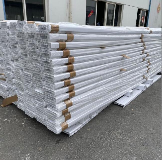 Professional installation of white PVC farm fencing