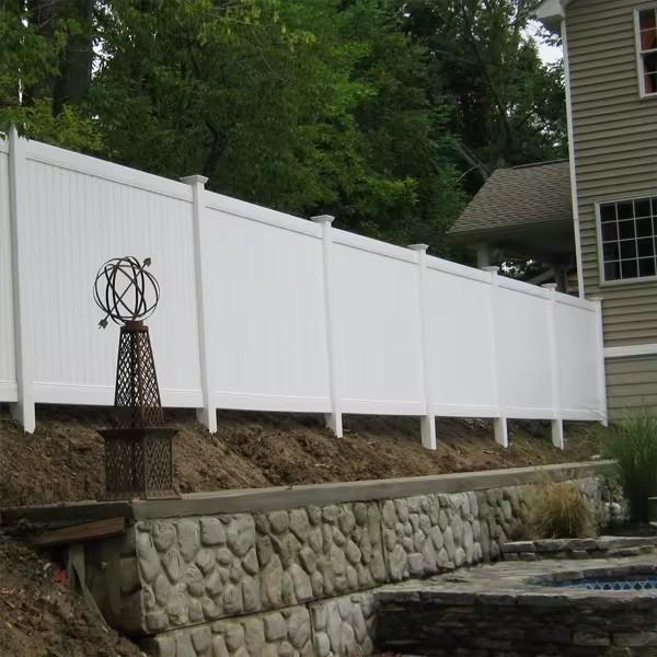 PVC privacy fence in garden setting