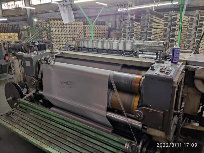 Stainless steel wire mesh roll in industrial setting