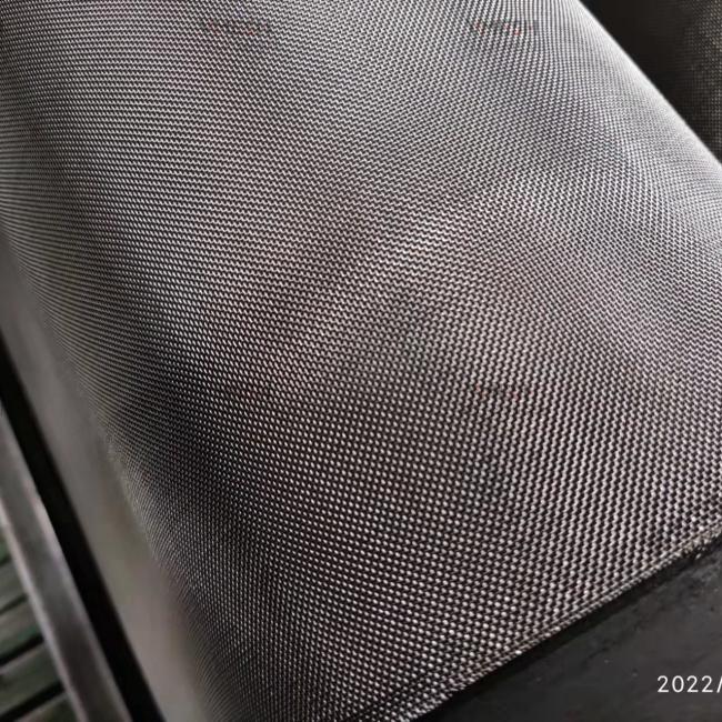 Stainless steel mesh sample demonstrating weave structure and hole size